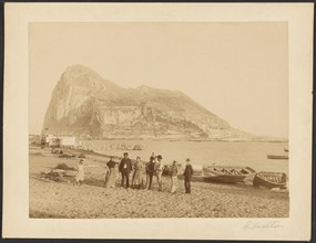 Group portrait in front of Rock of Gibraltar, about 1880-1895. Creator: Unknown.