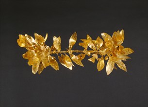 Wreath with detached stem including leaves and detached berries, 300-100 BC. Creator: Unknown.