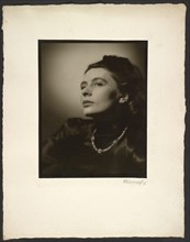 Woman with diamond necklace, 1945-1946. Creator: Gunther Krampf.