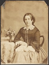 Portrait of seated woman, about 1860-1870. Creator: Unknown.