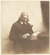 Portrait of a Clergyman with a Book, about 1852-1856. Creator: Roger Fenton.