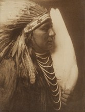 Three Feathers-A Nez Perce Native American, 1905. Creator: Edward Sheriff Curtis.