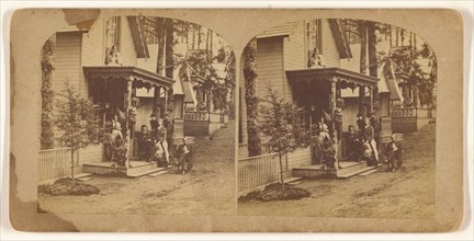 Family portrait posed on front porch of house, about 1865. Creator: Unknown.