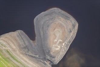 A ruined building revealed by low water levels at Howden Reservoir, Derbyshire, 2022. Creator: Emma Trevarthen.