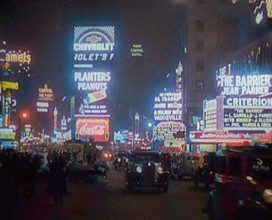 New York Times Square at Night Lit up By Lights, 1920s. Creator: British Pathe Ltd.