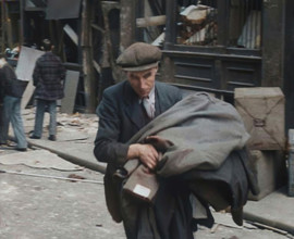 A Man Carrying His Possessions Away, 1940. Creator: British Pathe Ltd.