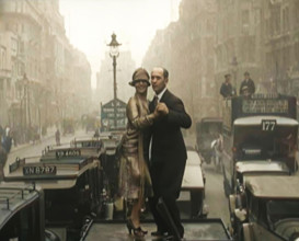 A Couple Dancing the Charleston on the Top of a Car Driving Down a London Street, 1926. Creator: British Pathe Ltd.