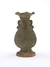 Vase with fluted mouth and molded floral design, early 1200s. Creator: Unknown.