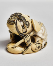 Netsuke (man with lion mask ), about 1850. Creator: Unknown.