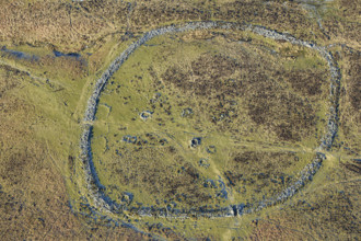 Grimspound, a partly enclosed stone hut circle settlement, Devon, 2024. Creator: Damian Grady.