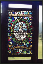 A stained glass window commemorating Lawrence Edward Grace Oates in The Oates Memorial Museum at
