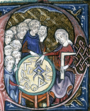 A woman teaching geometry, 1350. On the table are various geometrical shapes or instruments. The