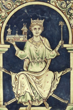 King Henry III with a representation of Westminister Abbey, c1250s. The king sits holding the abbey