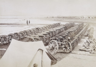 Captured guns, Kabul, Afghanistan, c1879. Cannons lined up in neat rows. A British soldier leans