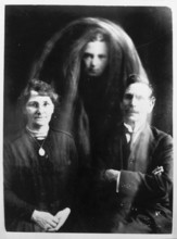 A 'psychic photograph', c1890-c1910. This photograph, which supposedly shows a ghost between a
