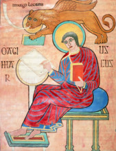 St Mark writing, c700. St Mark sits writing; a winged lion hovers above him. From the Lindisfarne