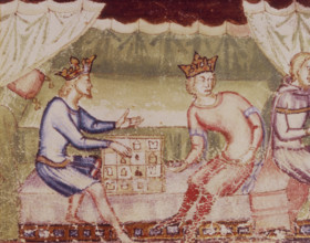 two kings playing chess, c1352-c1362. Two crowned men sit on a low couch. Between them is a chess