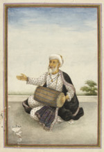 Kavval’, a sub-caste of the large Muslim caste of ‘Mirasis’ or singer/genealogists - A man beating