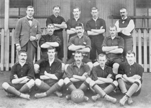 Group portrait of Woolwich Arsenal football team, 1896.  Creator: Symmons & Thiele.