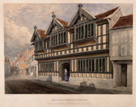 Ford's Hospital (Greyfriars' Hospital), Coventry: a woman standing at the entrance, c1840s.. Creator: Edward Pretty.