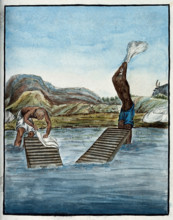 Two washer-men cleaning clothes by beating them against washing racks in a river. Creator: Unknown.