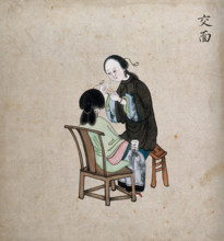 A standing woman preparing to remove facial hair from seated woman using a piece of string, 1800-99. Creator: Unknown.