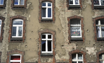 Houses adjacent to the shipyards, Gdansk, Poland, 2015.  Creator: Unknown.