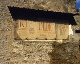 Roman graffiti on the wall, Road of Abundance, Pompeii, Italy, 2002. Creator: LTL.