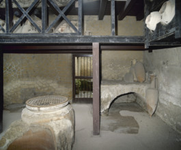 Wine shop, House of Neptune and Amphitrite, Herculaneum, Italy, 2002. Creator: LTL.