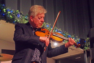 Mike Piggott, East Grinstead Jazz Club, Apron Café, Chequer Mead Theatre, West Sussex, April 2025. Creator: Brian O'Connor.