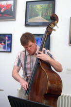 Stuart Barker, Stuart Henderson Quartet, Clocktower Cafe Jazz Club, Croydon, London, April 2025. Creator: Brian O'Connor.