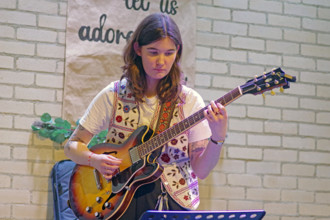 Maddy Salter, International Women’s Day, NJA Fundraiser, Baptist Church, Loughton, Essex, 2025. Creator: Brian O'Connor.