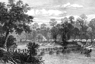 The Ashantee War: the Camp at Prah-Su - native artillery crossing the river..., 1874. Creator: Unknown.