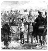 Review at Windsor: the Queen presenting the Cross of...St. George to Sir Garnet Wolseley, 1874. Creator: Unknown.