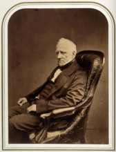 An unidentified man in an armchair. Creator: Maull & Polyblank.