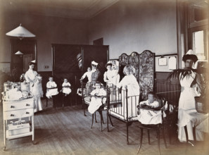 Johannesburg Hospital, South Africa: small hospital ward with nurses and children, c1905. Creator: Unknown.