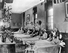Hahnemann Hospital and Homeopathic Dispensaries, Liverpool: a women's ward, decorated..., [1910?]. Creator: Unknown.