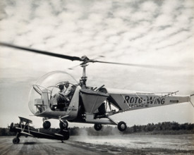 Sir Gordan Covell in a helicopter, Beltsville, Maryland, 1948. Creator: Unknown.