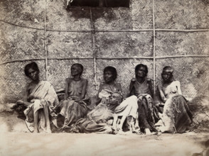 Famine in Mysore, India: six emaciated women, five sitting and one leaning on another's lap, 1876-78 Creator: Willoughby Wallace Hooper.