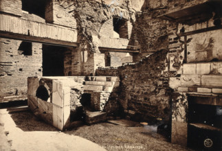 Partly ruined buildings in Ostia identified as a tavern or hot-food shop (thermopolium)..., 1928. Creator: Unknown.