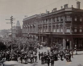 South Africa: a crowd of people gathered outside The Goldfields offices in Johannesburg, 1896. Creator: Unknown.