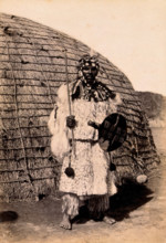 South Africa: an African chief in a dress of angora goatskin, 19th century. Creator: Unknown.