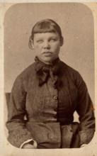 A young woman with a short fringe, showing signs of mental deficiency, c1860s. Creator: John Davis.