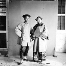 Amoy, Fukien province, China: a married couple, standing, 1870. Creator: John Thomson.