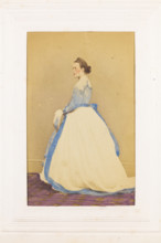 A man in drag standing side-on, [between 1890 and 1899?]. Creator: Unknown.