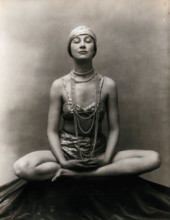 Marguerite Agniel posing with her legs crossed and hands together resting on her legs, 1929. Creator: Unknown.
