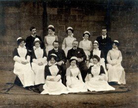 James Rutherford Morison with his staff: three men and ten women, c1900. Creator: Unknown.