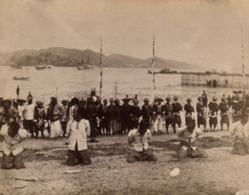 Kowloon, Hong Kong: five pirates awaiting beheading, while Chinese soldiers and dignitaries..., 1891 Creator: Unknown.