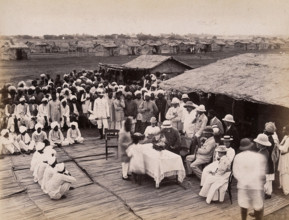 Discharged hospital patients after bubonic plague outbreak, being given relief money..., 1897. Creator: Unknown.