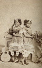 The Millie-Christine sisters, conjoined twins, standing, c1871. Creator: Unknown.